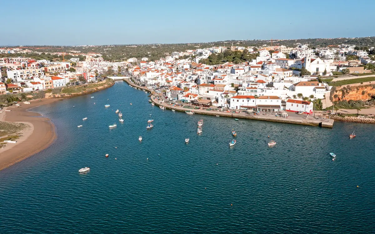 The village and cove of Benagil seen from the water