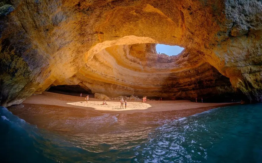 The arch of Benagil cave seen from inside, looking out to sea